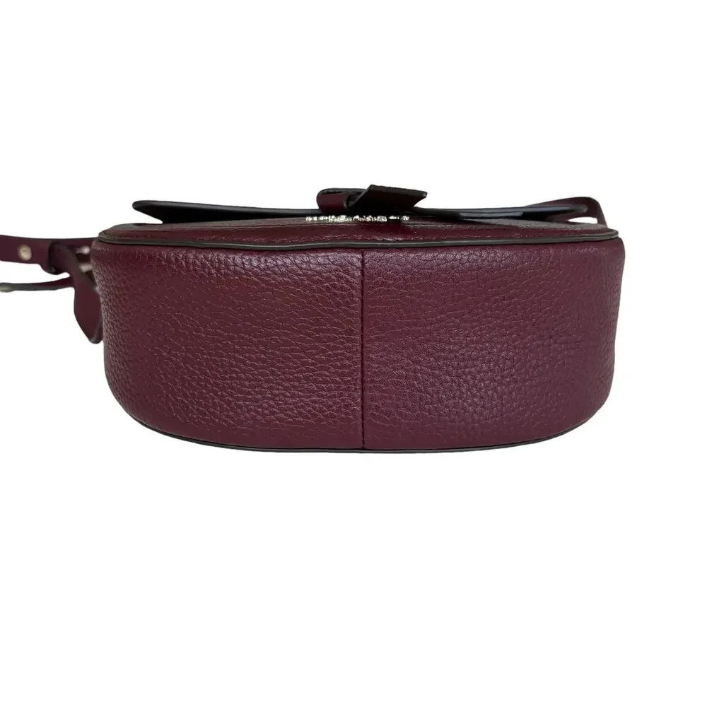 Kate Spade New York Classic Knott Pebbled Leather Medium Saddle Bag in Grenache - Picture 10 of 14